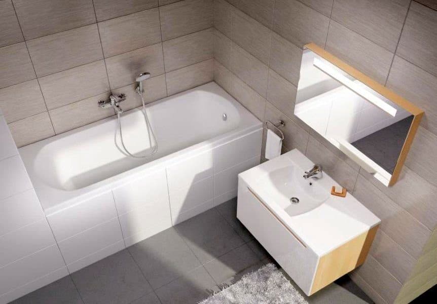 картинка Акриловая ванна Ravak Domino 170х75 с ножками CY00030000 и сливом-переливом X01507 